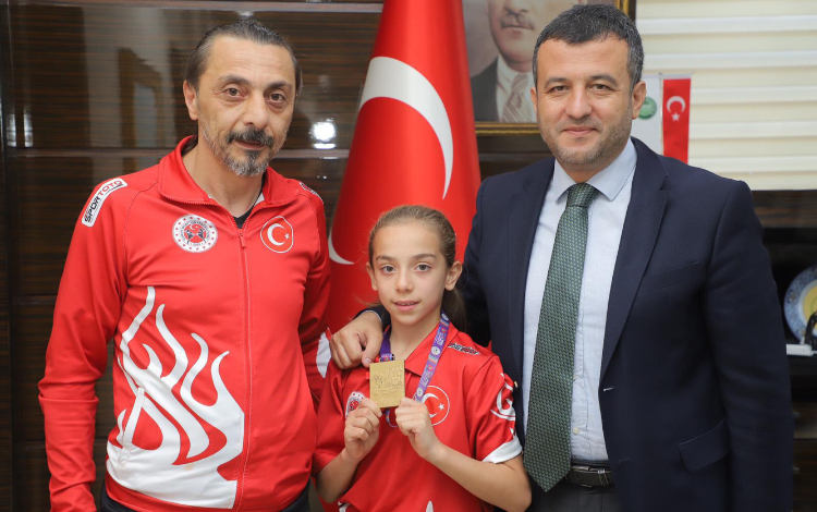 DÜNYA ŞAMPİYONU BAŞKAN DOĞAN’I ZİYARET ETTİ